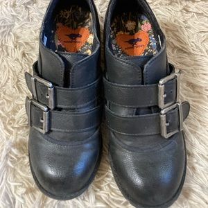 Ladies black side buckle shoes